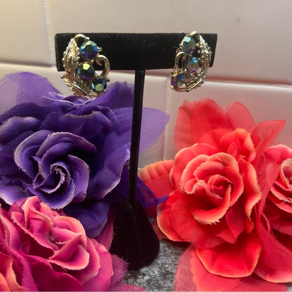 Vintage D&E Juliana earrings, purple auroura borealis stones, gold clips.